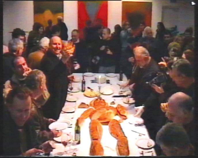    "On the Table". 2002.  Installation.  Bread, table, plates, glasses, cutlery.  Artists house, Tel Aviv.  Video from performance.  